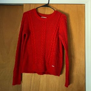 True red cable knit sweater